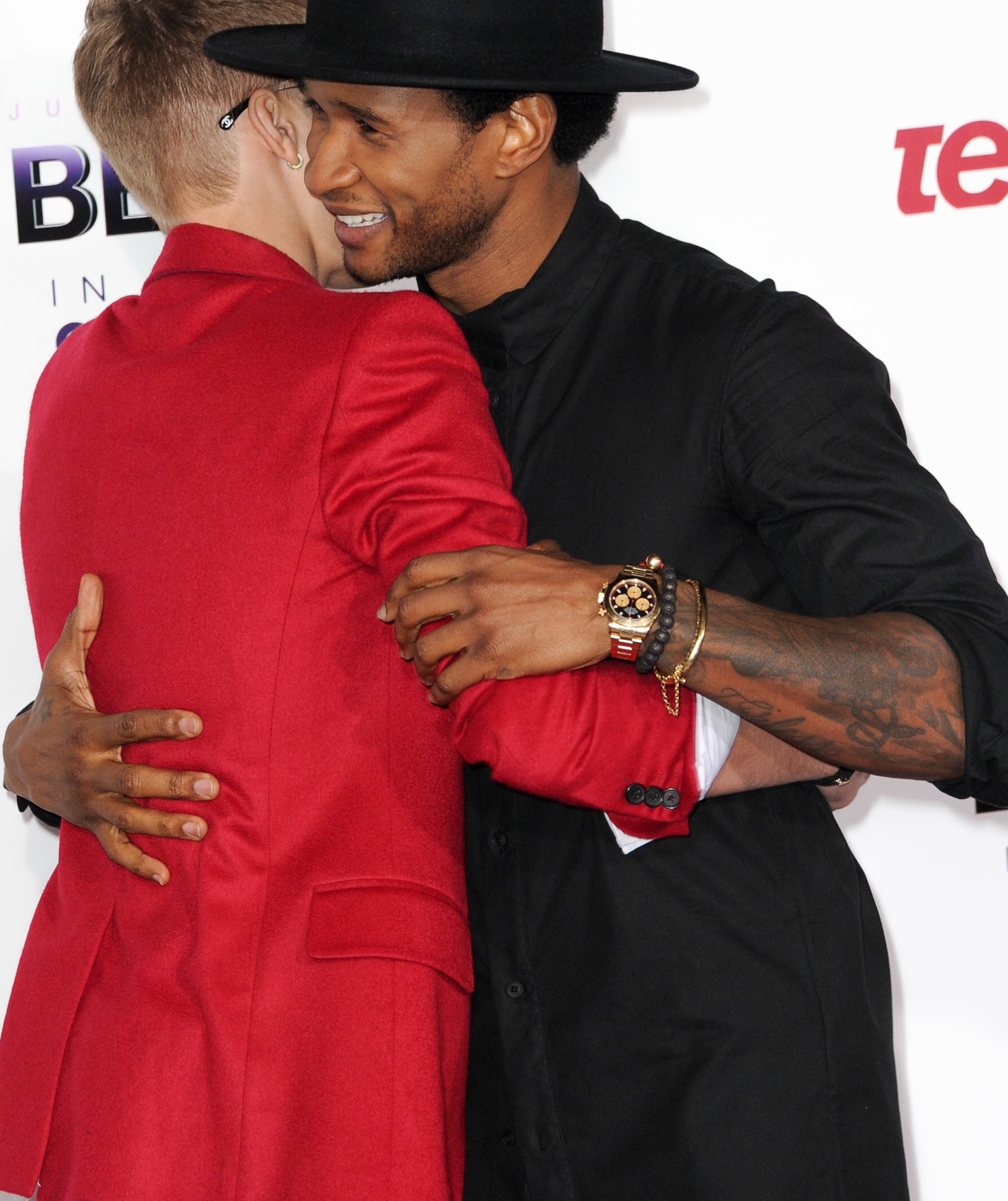 Closeup of Justin and Usher embracing