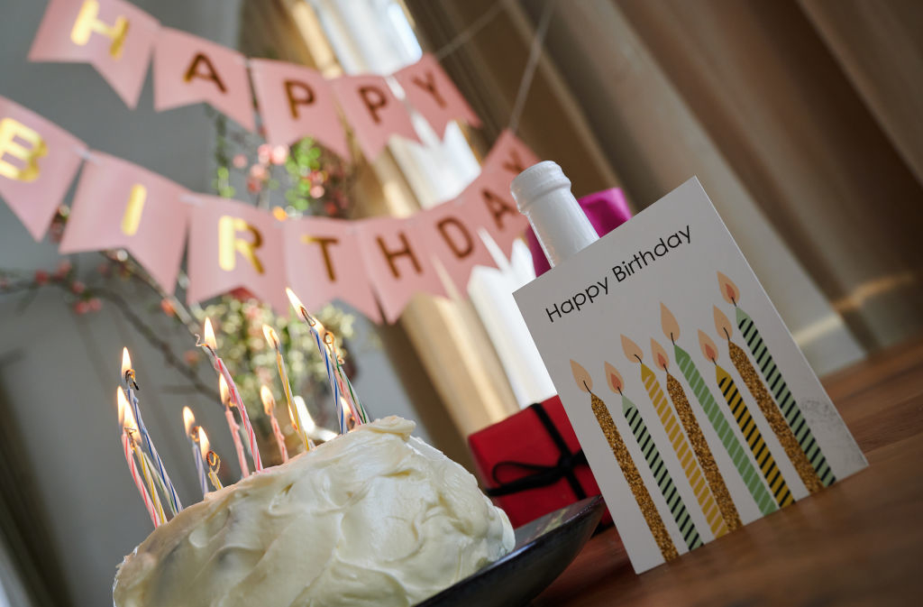 A birthday cake and card