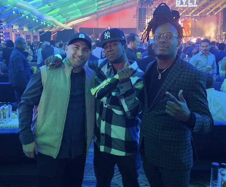 Karlton Jahmal with friends at the Maxim Super Bowl party