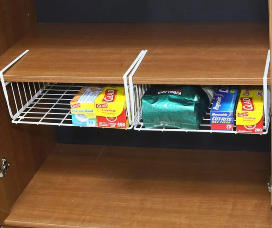 black under-shelf wire organizer with pantry supplies