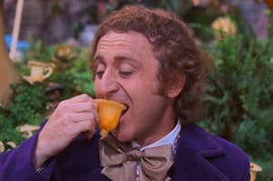 Gene Wilder eating a teacup as Willy Wonka