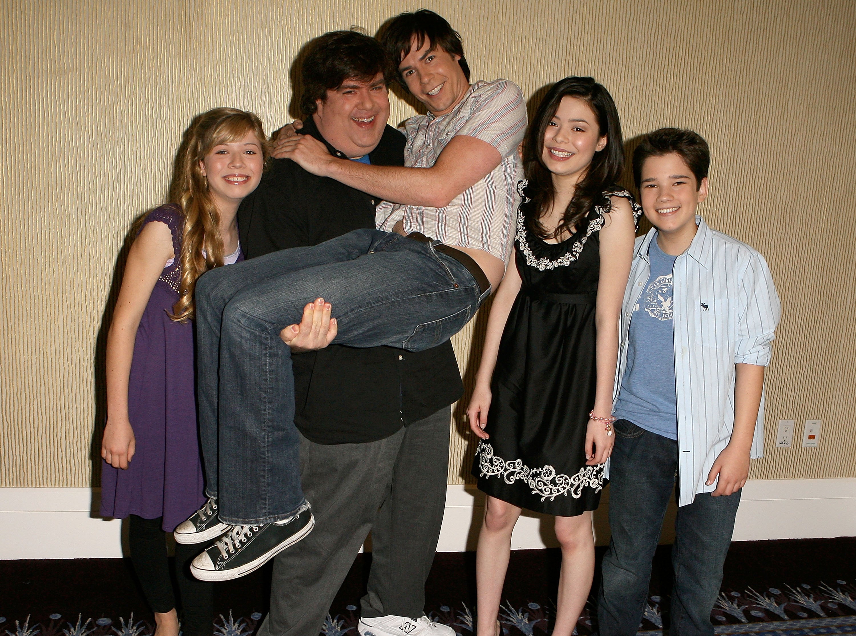 Dan Schneider with the cast of &quot;iCarly&quot;