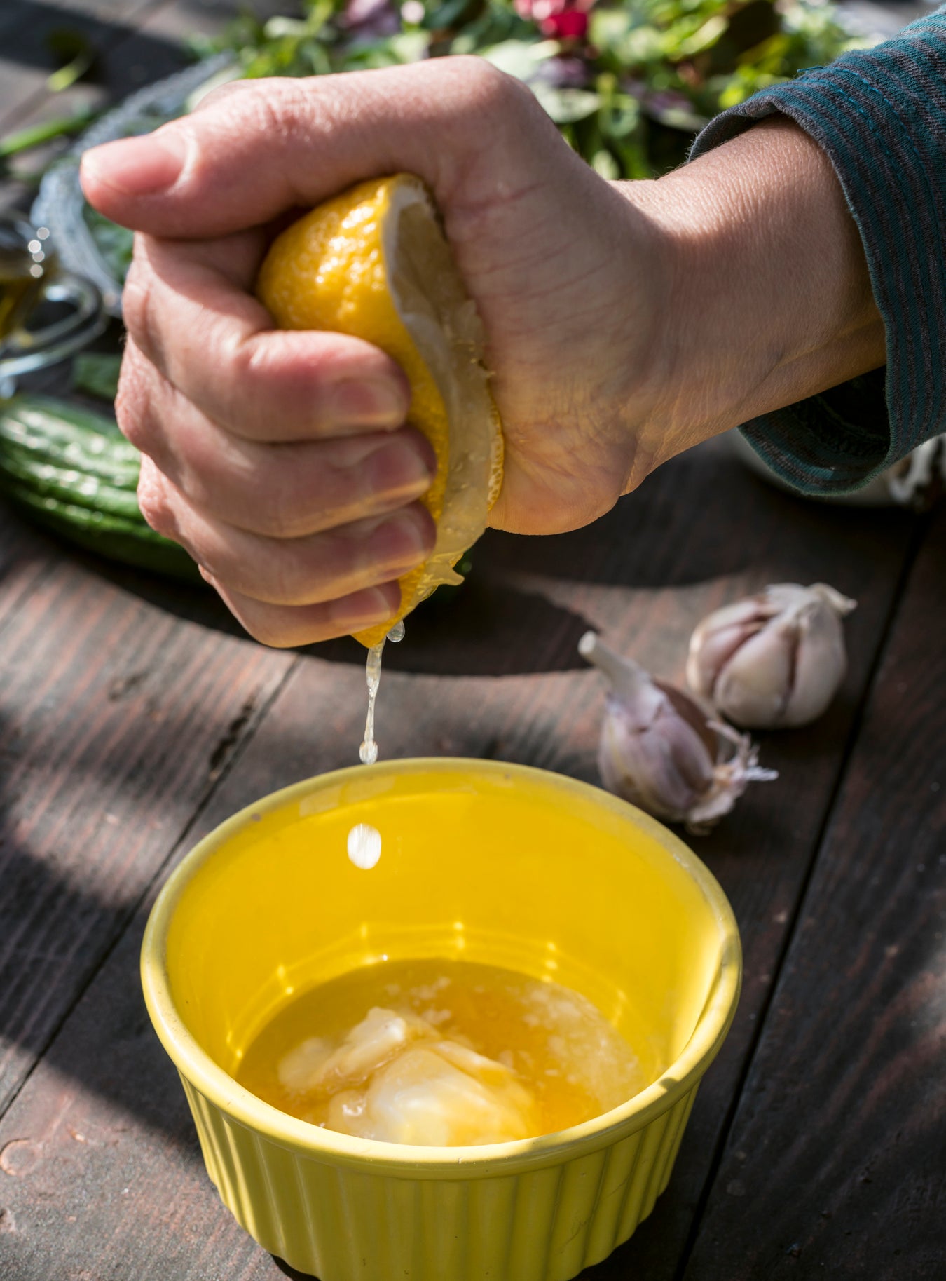 Squeezing lemon into a bowl