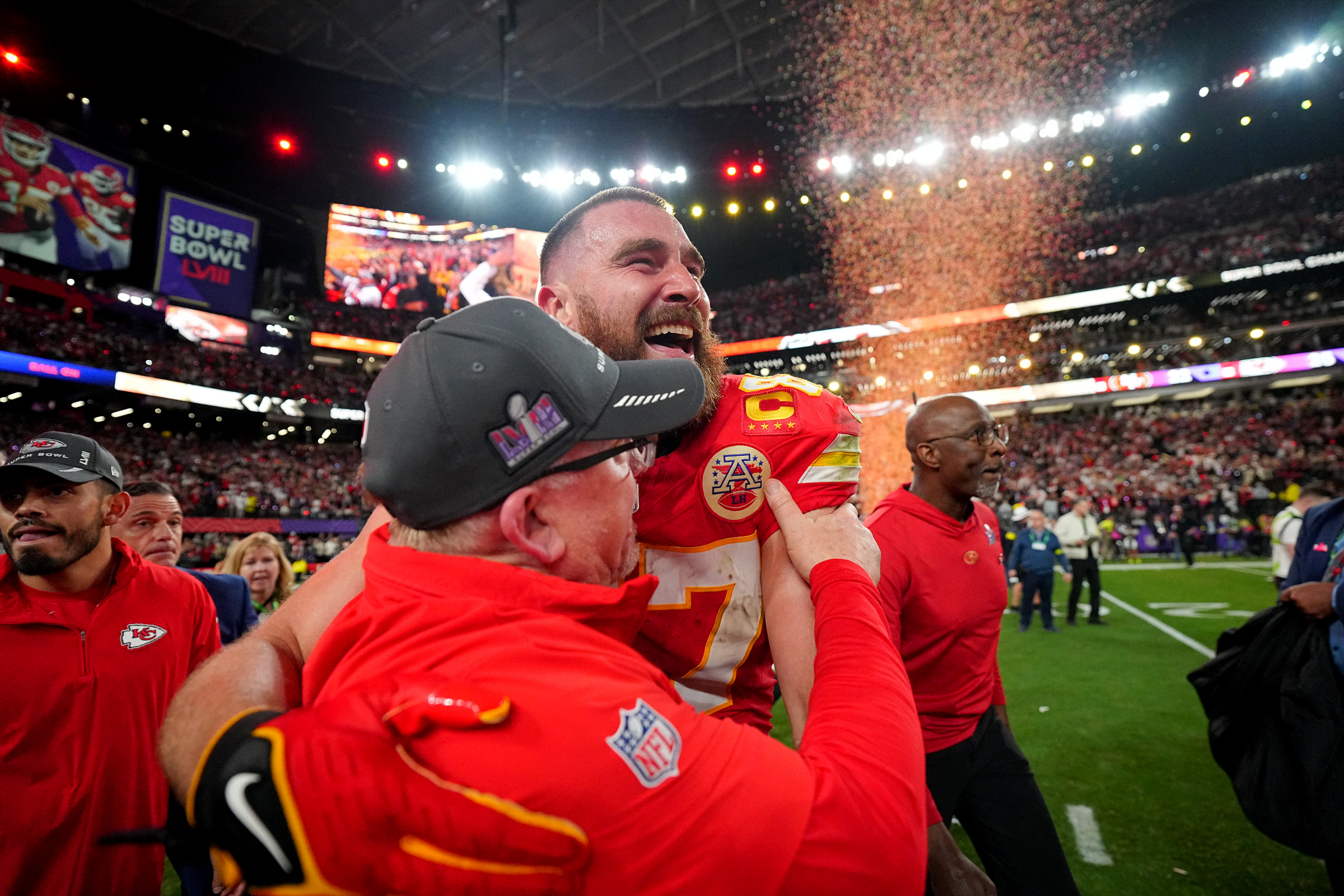 Andy Reid and Travis Kelce celebrating their Super Bowl win