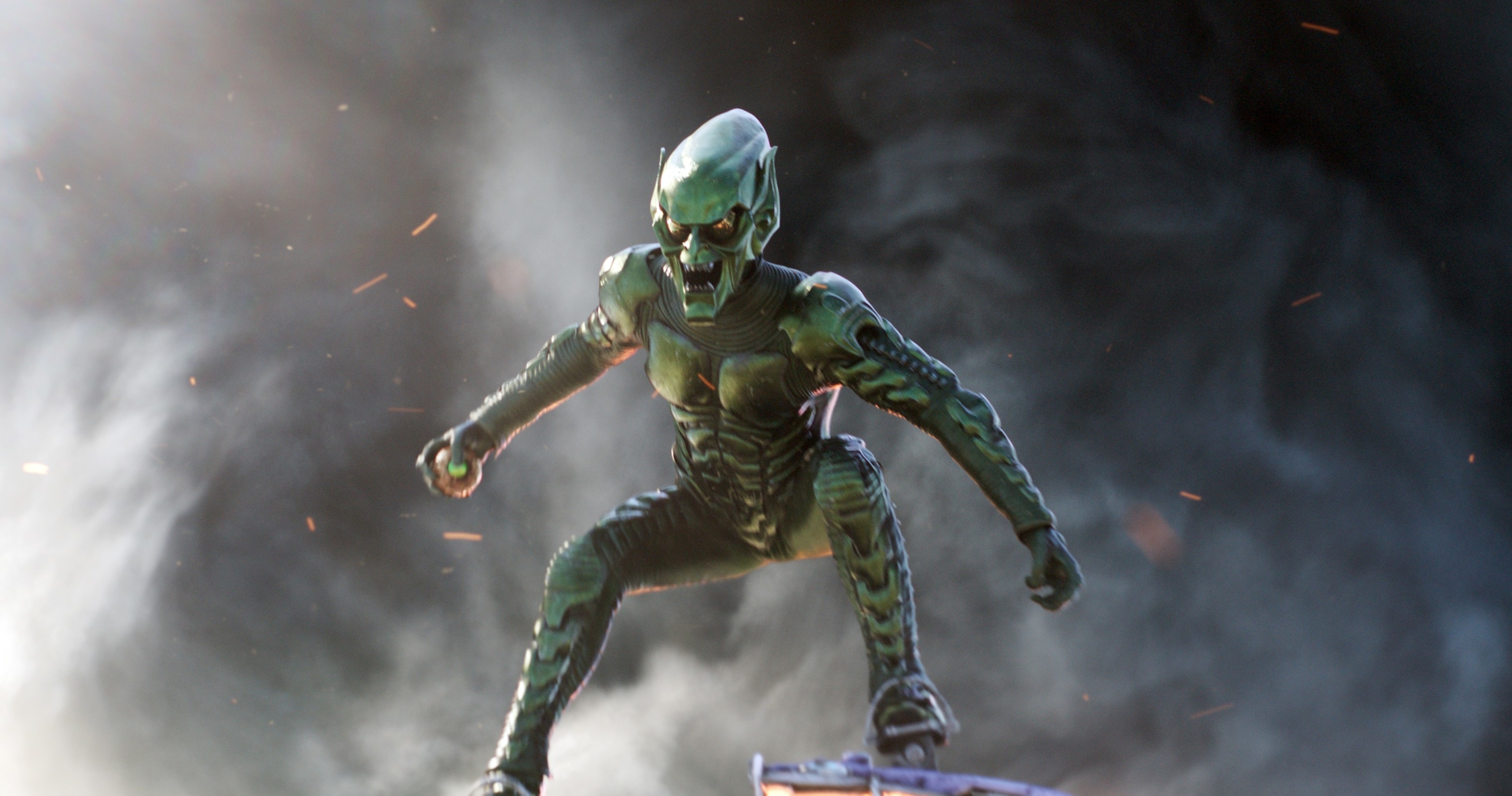 Image of a figurine based on an alien character from a sci-fi franchise, posed aggressively with a smoky background