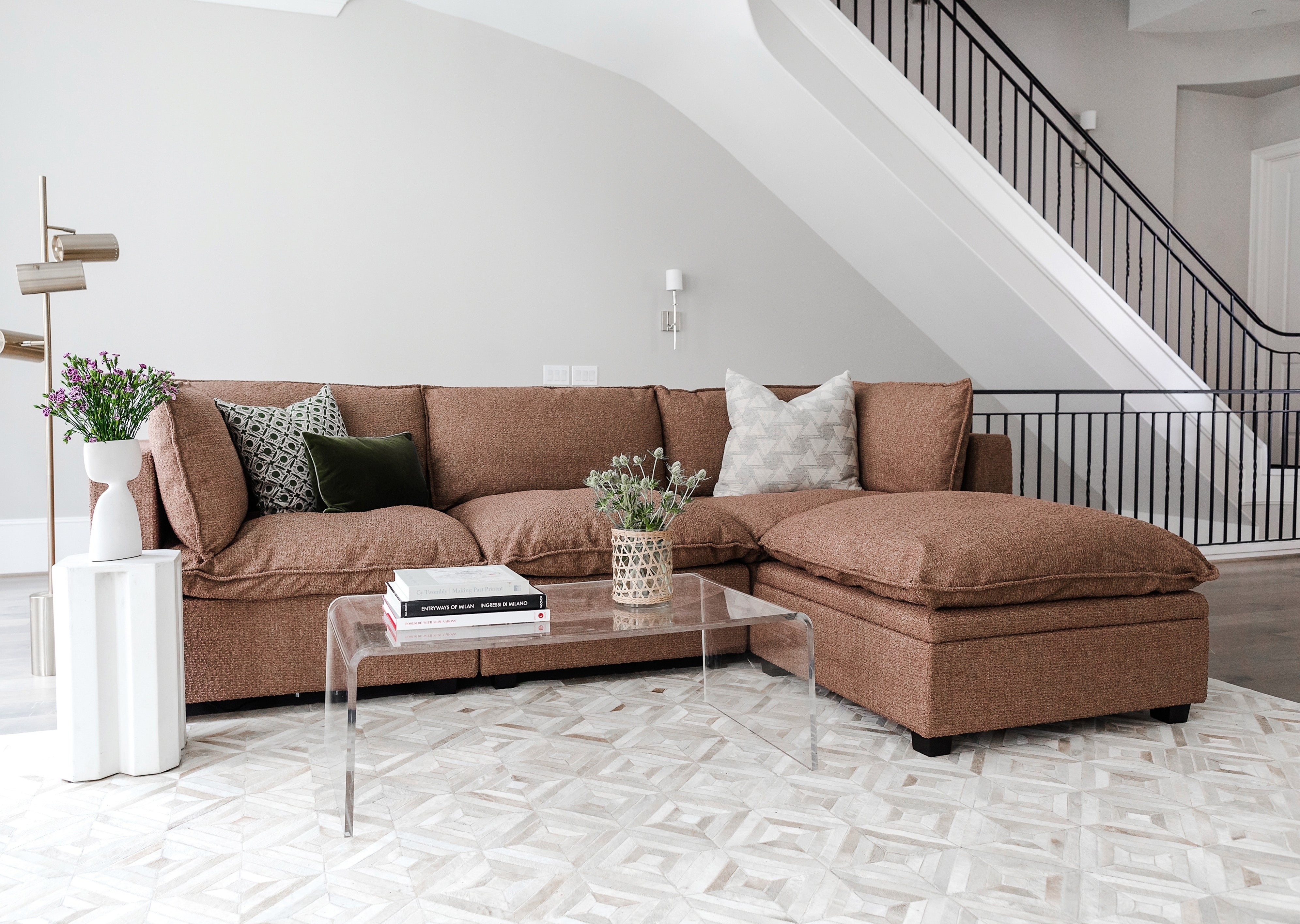 A brown sectional in a living room