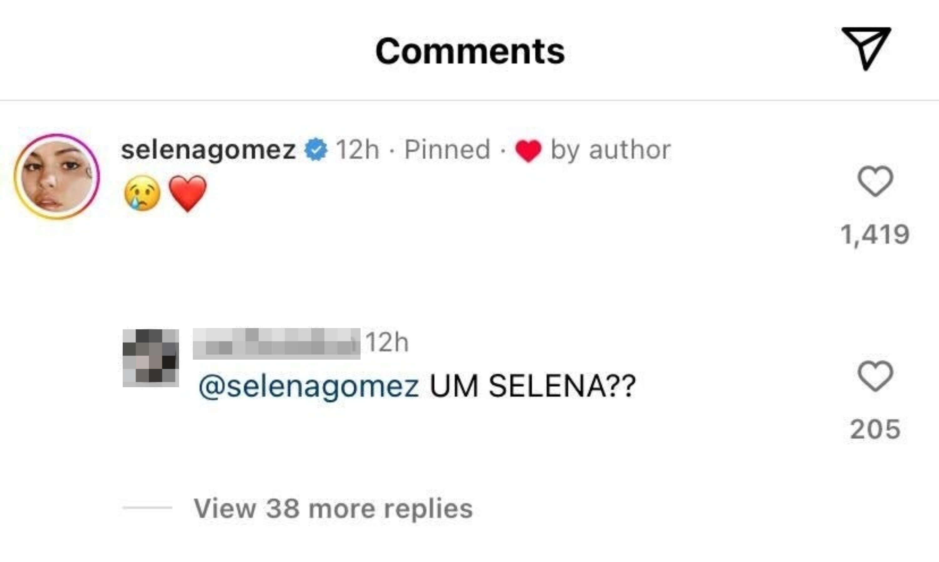 An account responds with (&quot;Um Selena??&quot;) after Selena posts the emojis