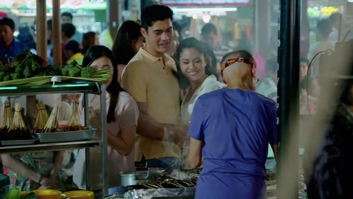 Group of people at a street food stall