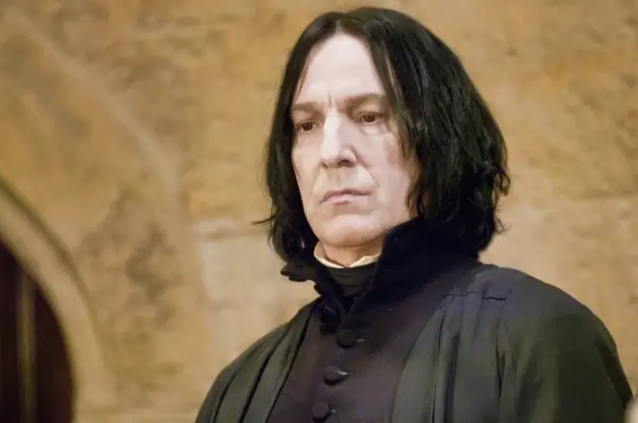 Severus Snape, a character from Harry Potter, is shown with a stern expression in dark wizard attire