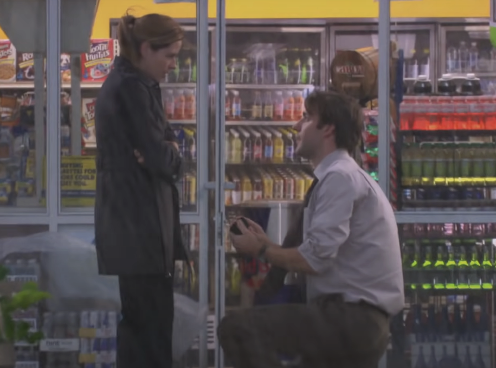 Jim proposes to Pam outside a convenience store