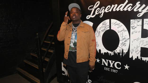 troy ave is pictured at an event