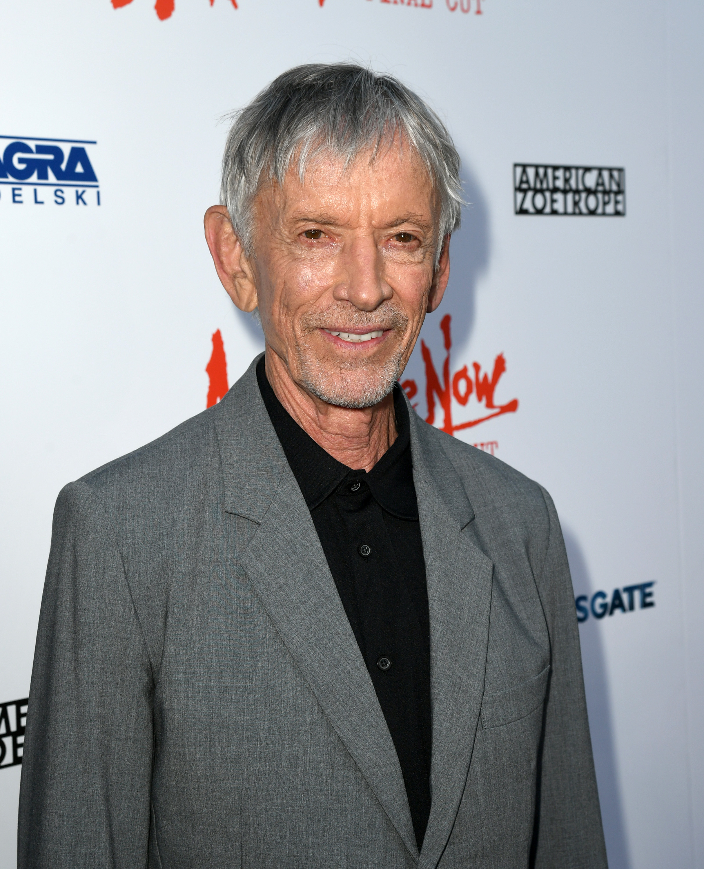 Scott Glenn in a structured grey suit at a film premiere