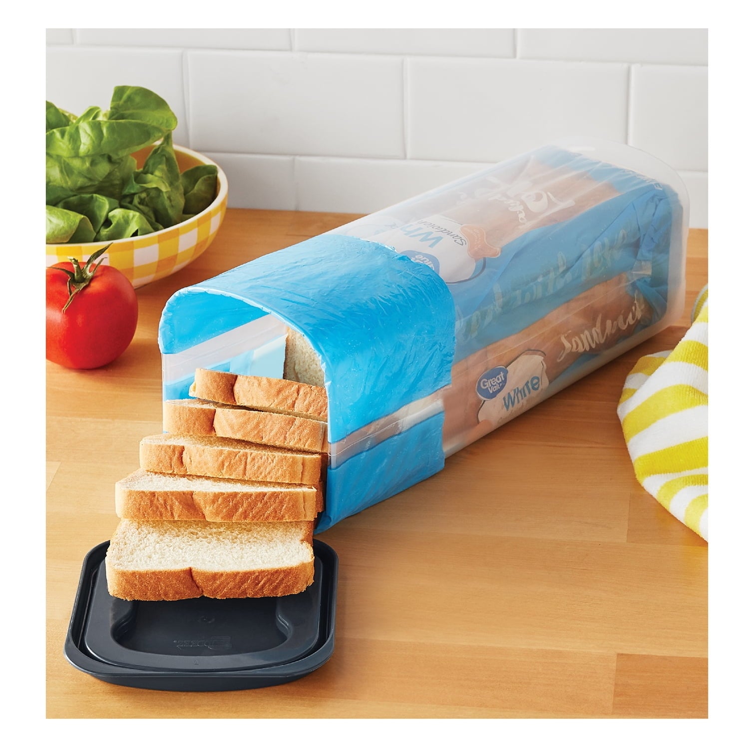 the breadstuff  saver with a loaf of breadstuff  inside