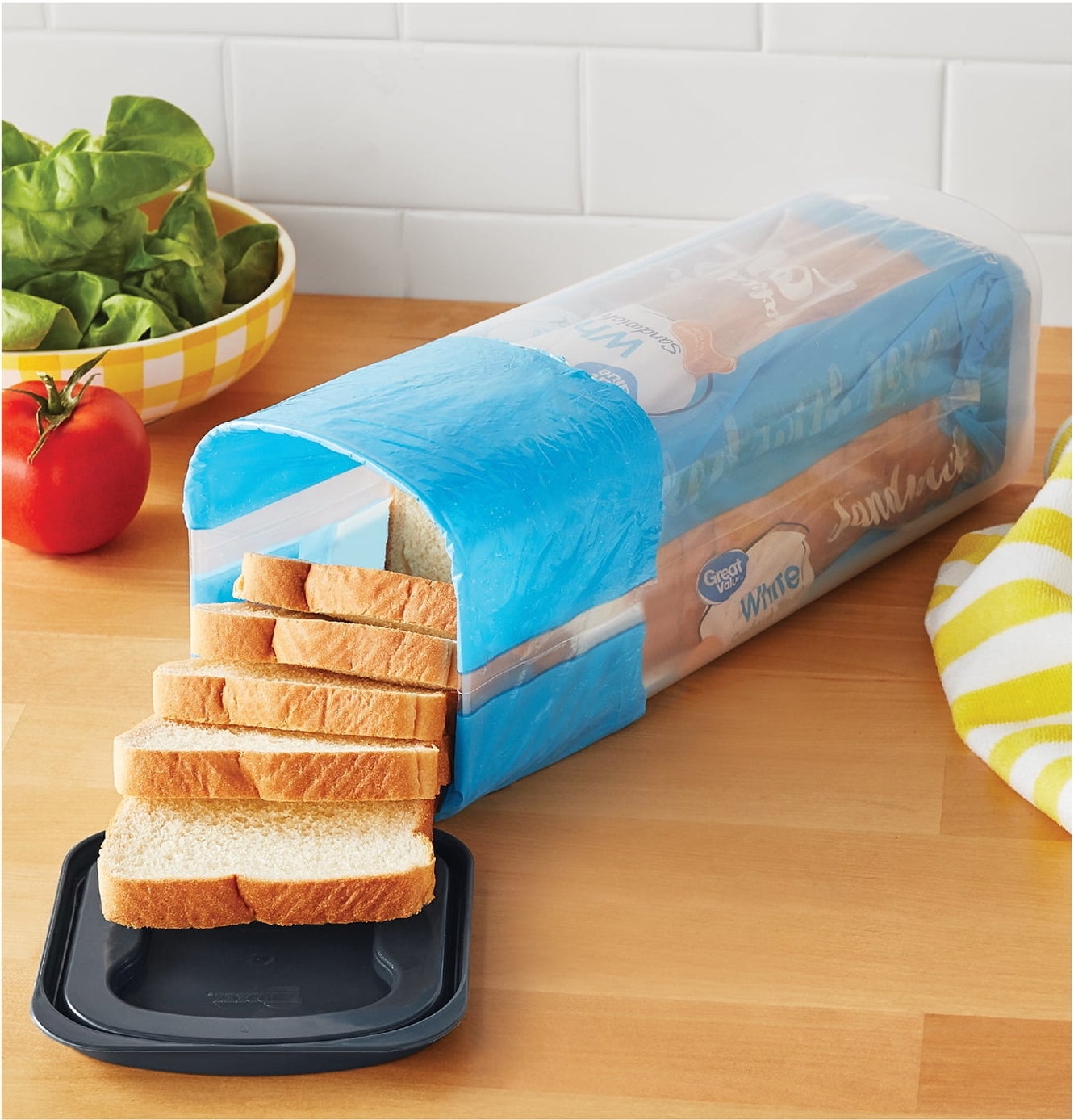 the bread saver with a loaf of bread inside