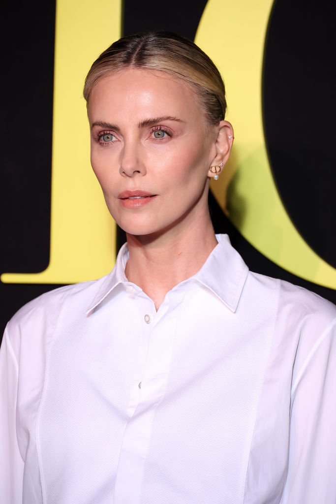 Charlize Theron posing at an event