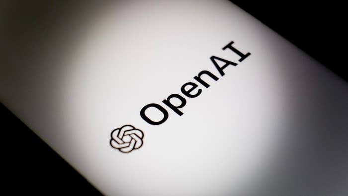 OpenAI logo displayed on a digital screen