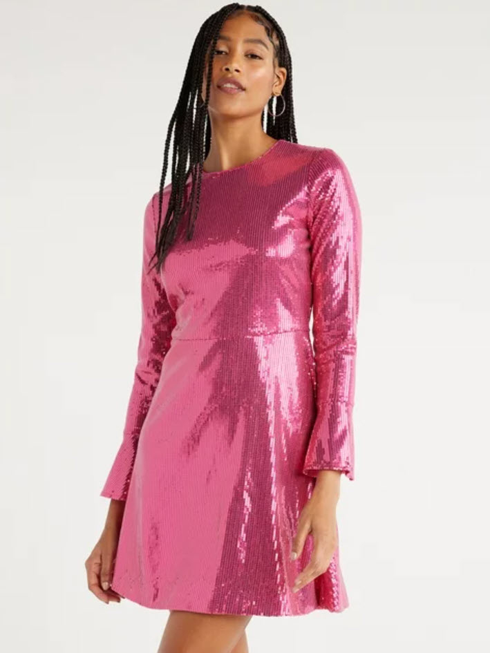 model in a pink sequined knee-length dress with long sleeves