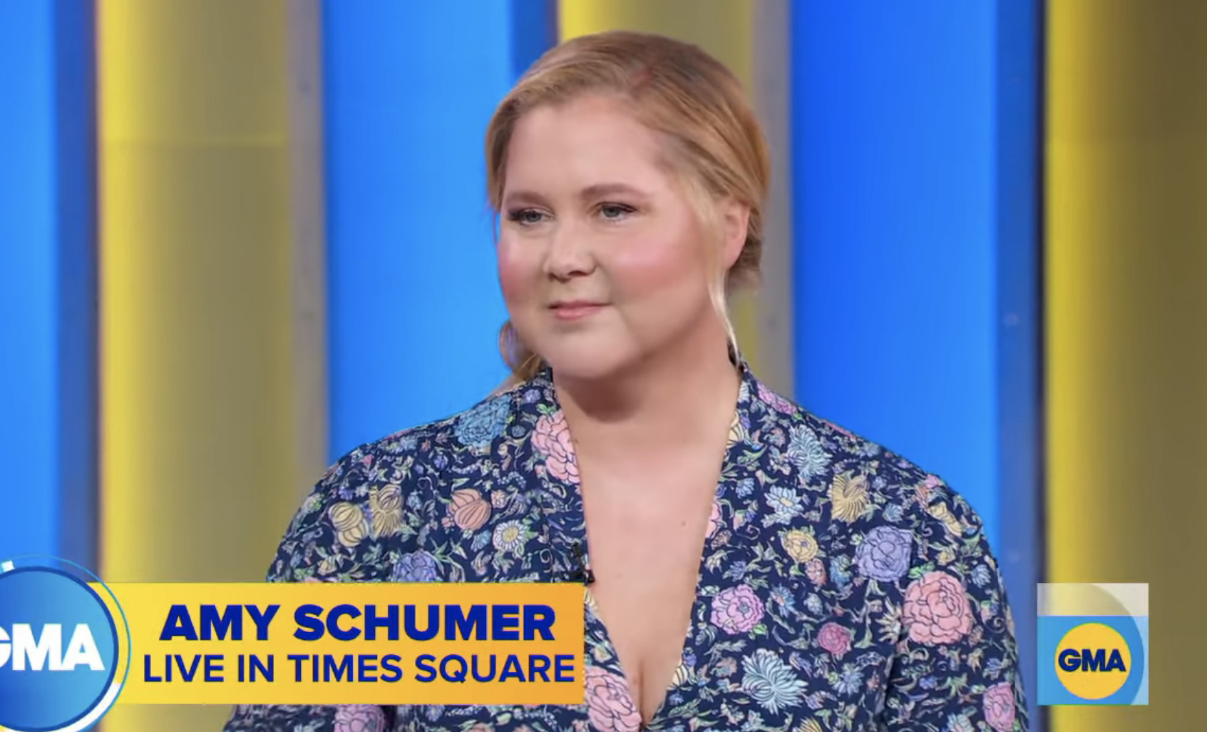 Amy wearing a floral top during a Good Morning America interview