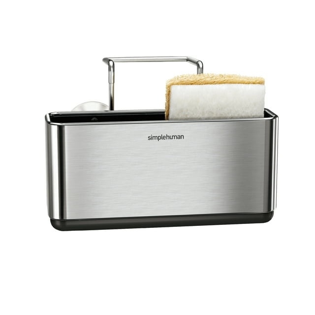 A simplehuman stainless steel sink caddy holding a sponge and brush