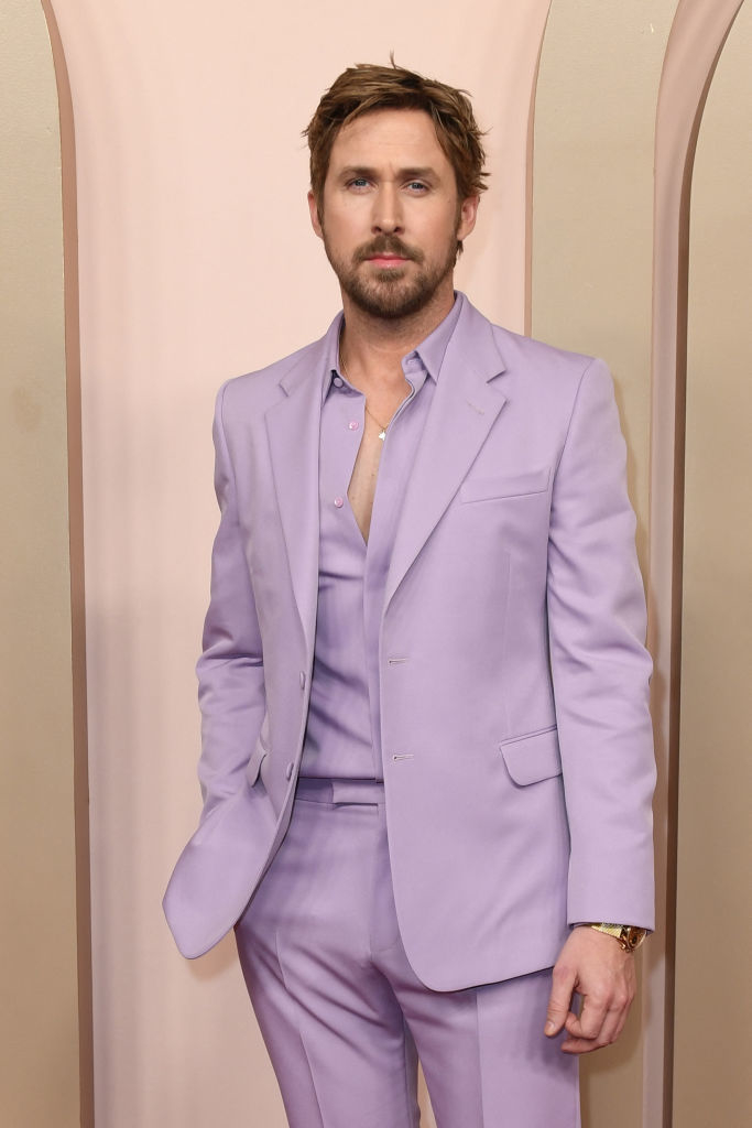 Ryan is wearing a lavender suit