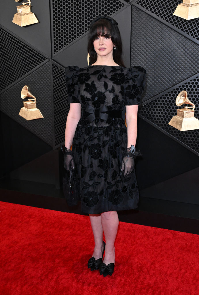 Lana in black, floral-patterned dress and gloves at the Grammy Awards