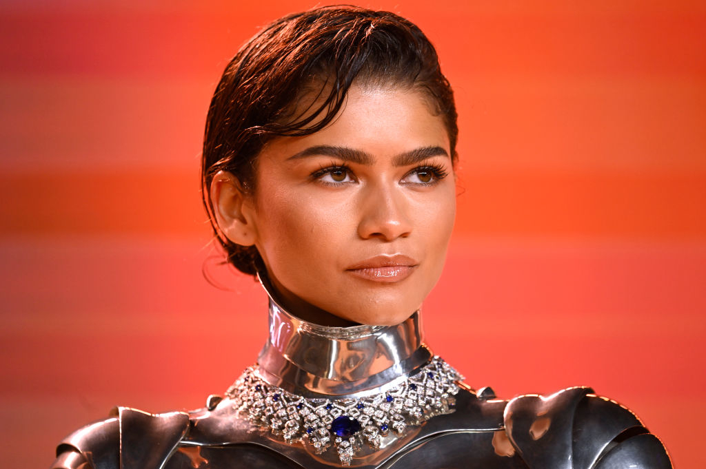 Zendaya in futuristic metallic outfit with statement neckpiece