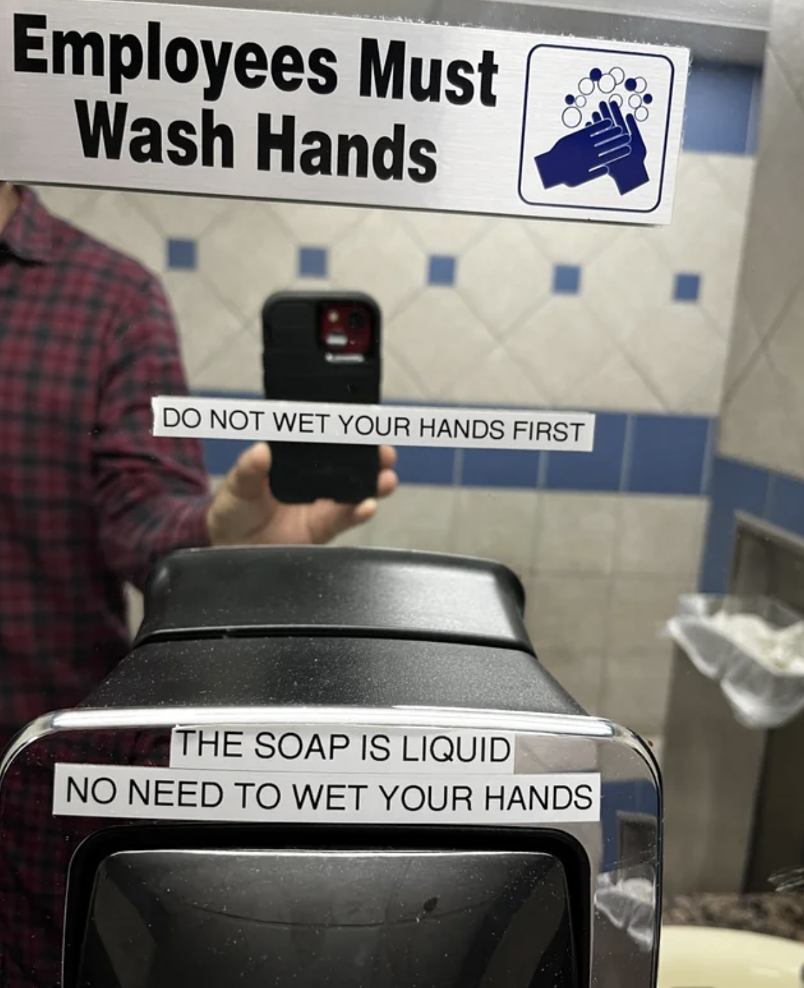 Signs: &quot;Employees Must Wash Hands&quot; above mirror &amp;amp; &quot;THE SOAP IS LIQUID NO NEED TO WET YOUR HANDS&quot; on soap dispenser