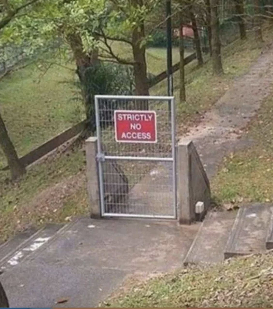 Sign on gate reads &quot;STRICTLY NO ACCESS&quot; but you can easily walk around it