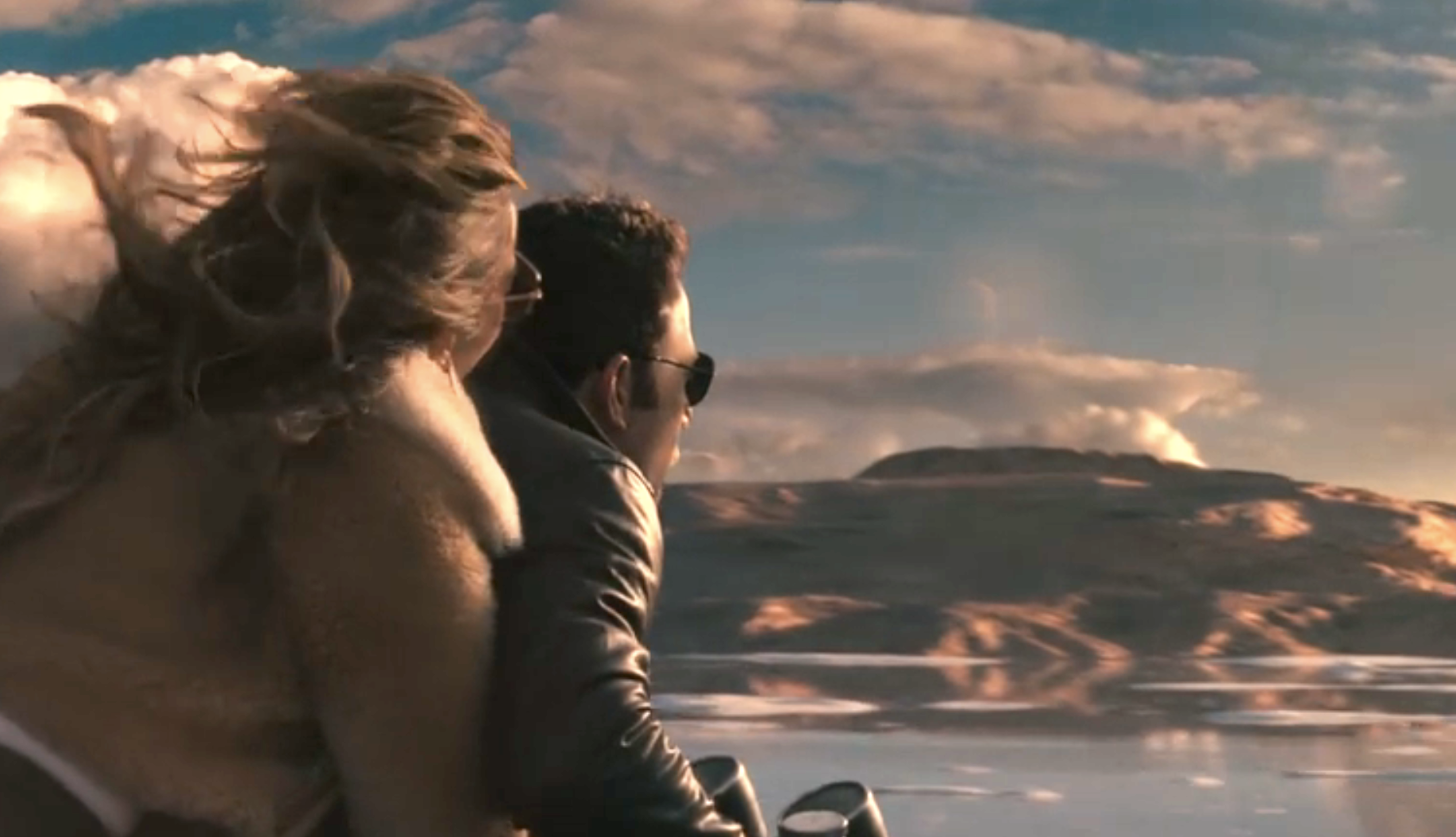 j.lo and ben riding off in a motorcycle