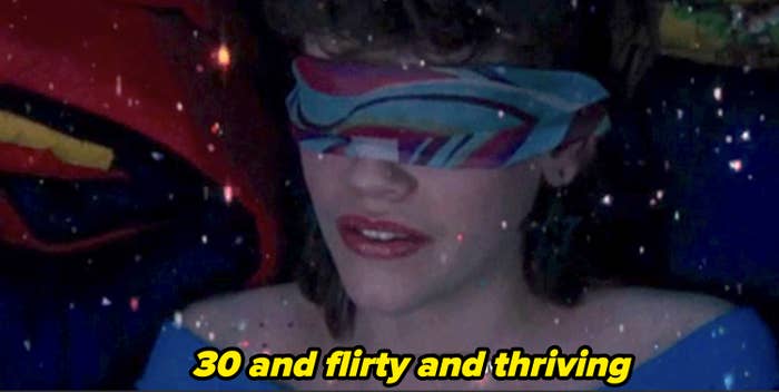Character with blindfold and sparkly top, caption reads &quot;Thirty and flirty and thriving.&quot;