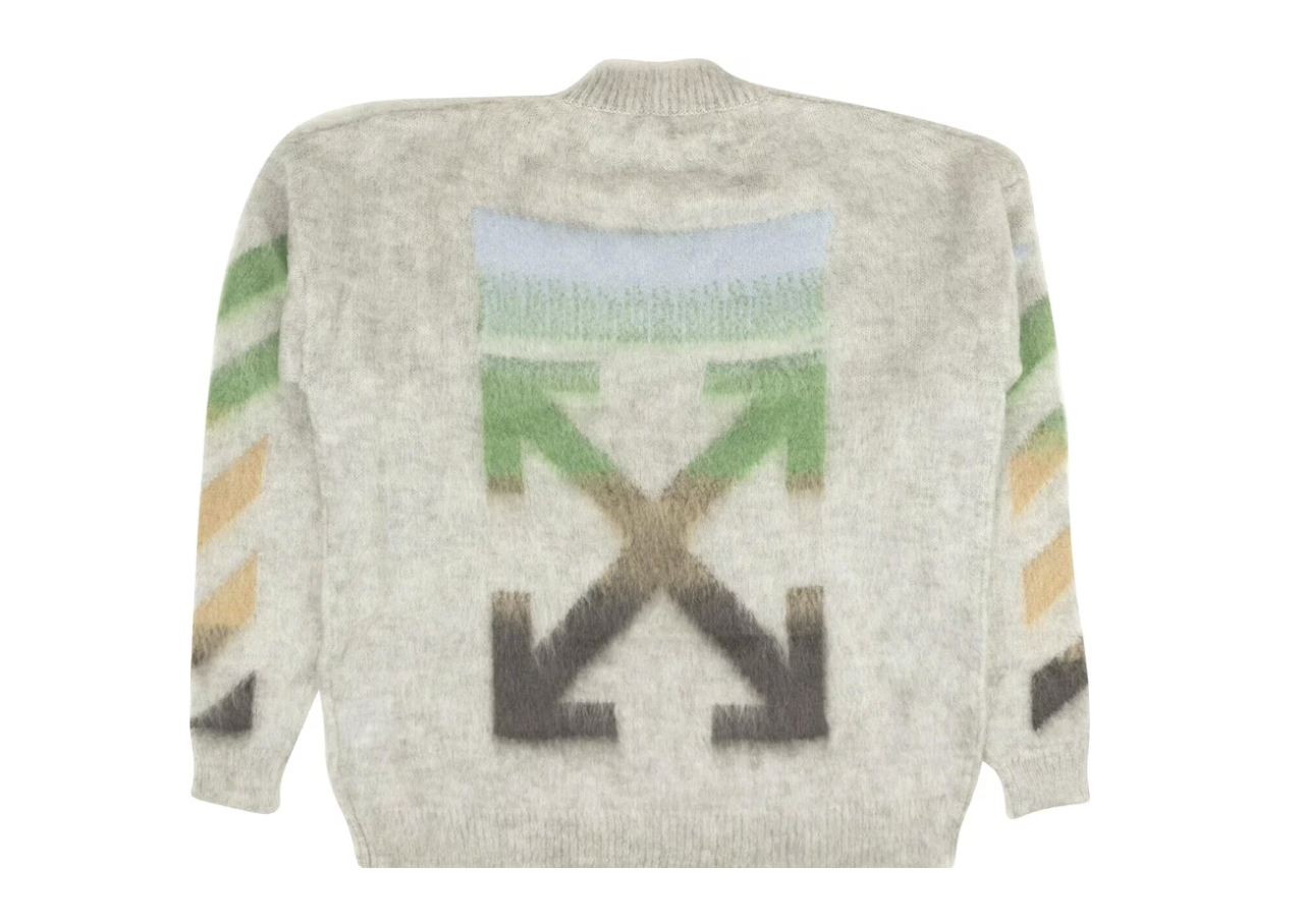 Graphic sweater with abstract design and various geometric shapes