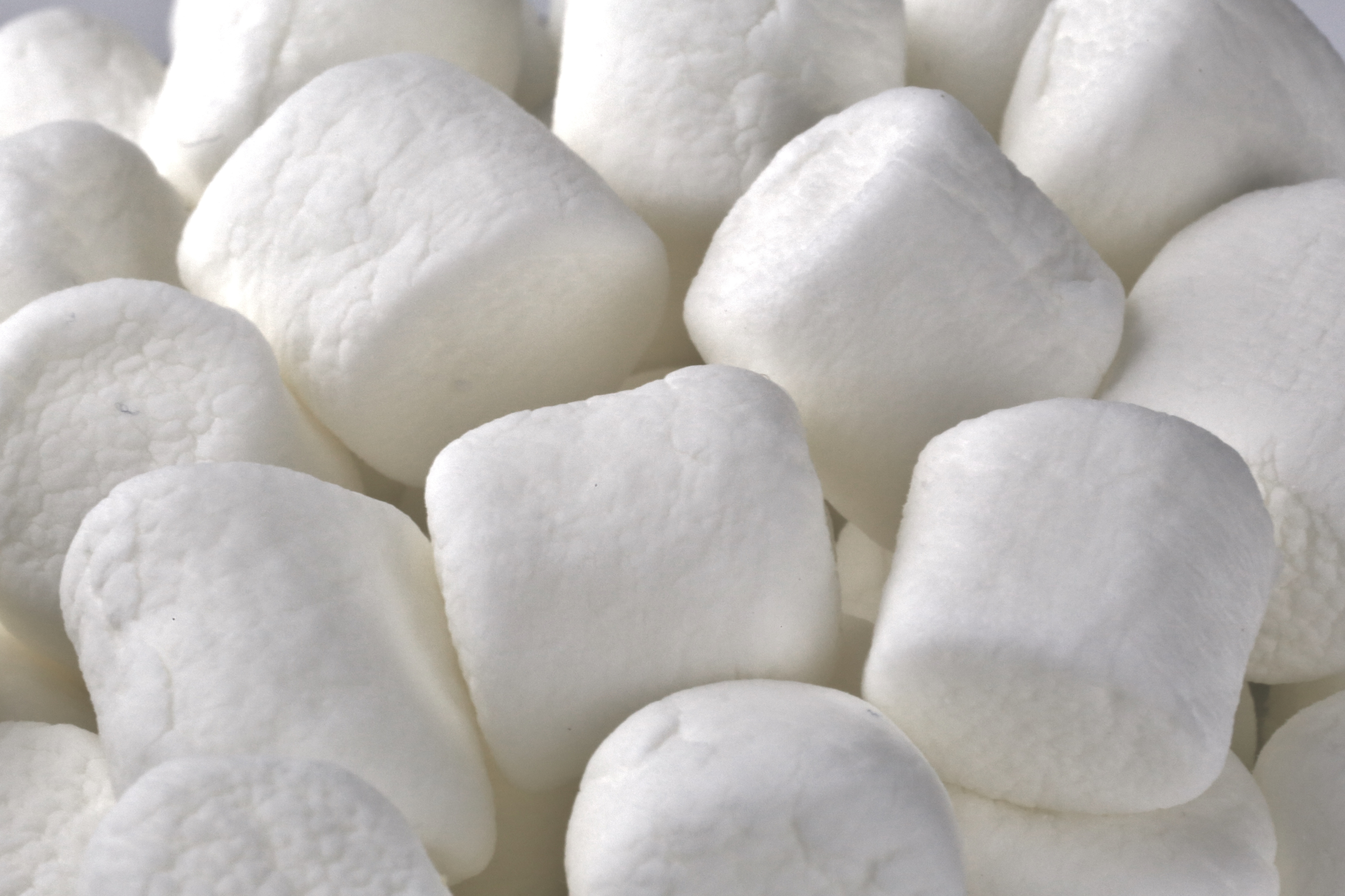 Close-up of multiple marshmallows filling the frame