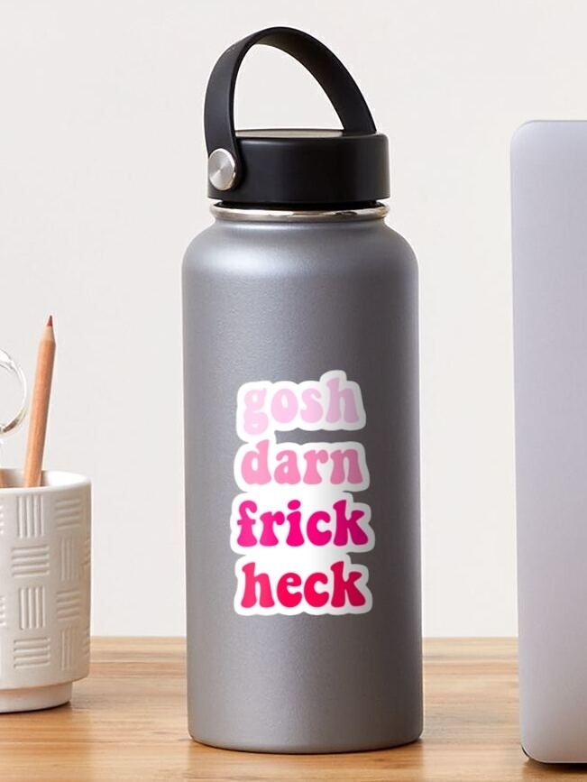 A water bottle with a humorous phrase in bold letters on a wooden desk, next to a pencil holder and laptop