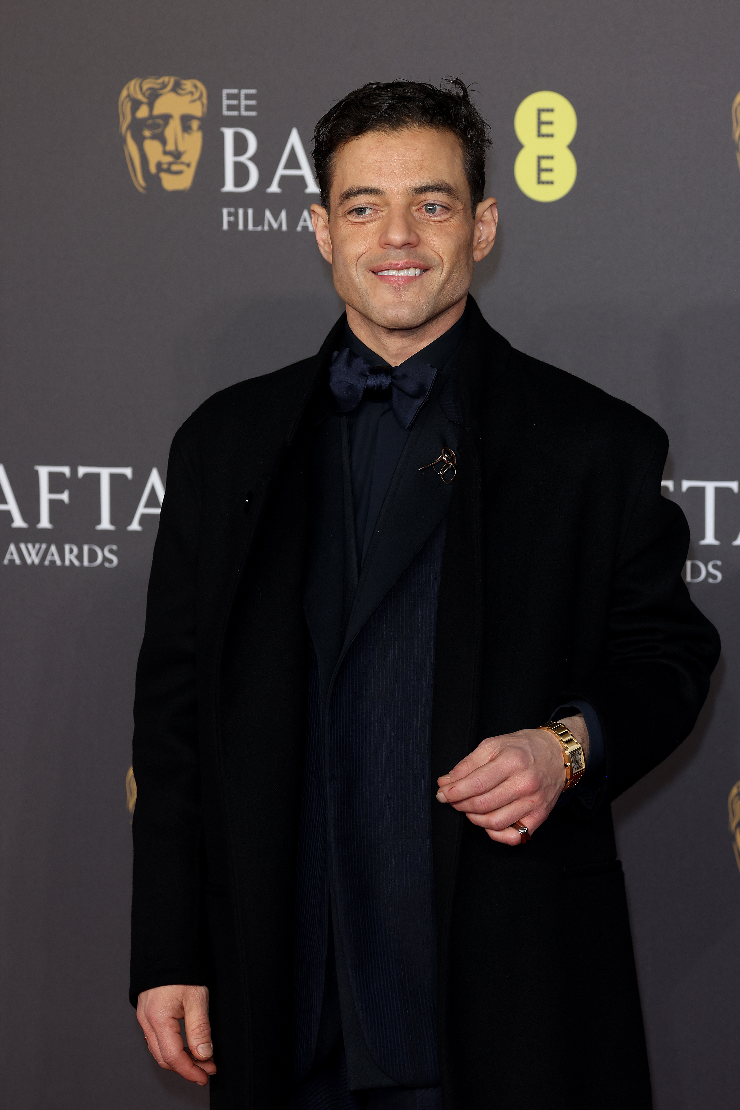 Rami Malek in a black tuxedo with a bow tie at the BAFTA awards