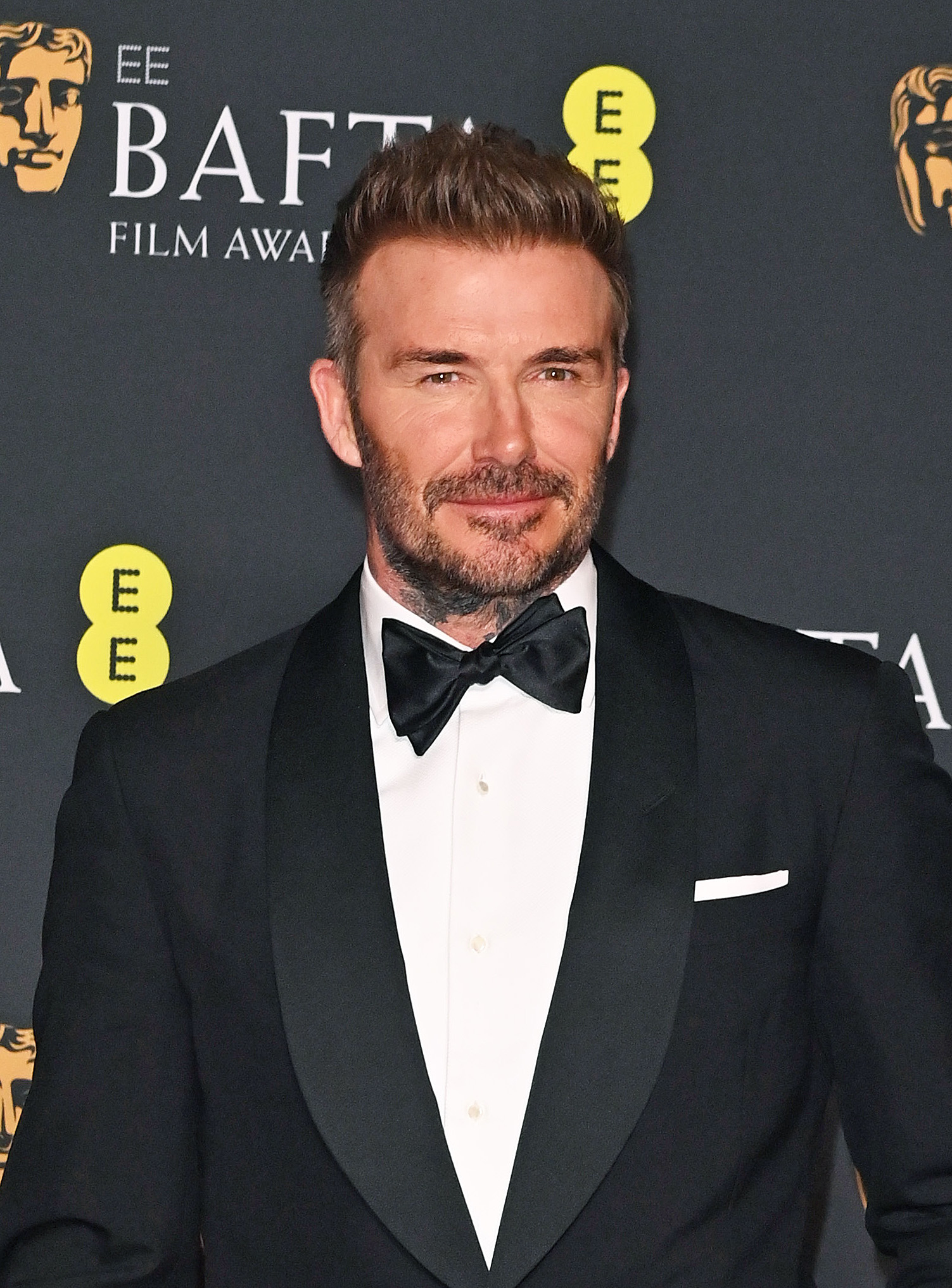 David Beckham in a black tuxedo with a bow tie at the BAFTA Awards