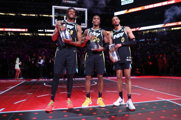 Myles Turner #33, Bennedict Mathurin #00, and Tyrese Haliburton #0 of the Indiana Pacers celebrate after winning the KIA Skills Challenge as a part of State Farm All-Star Saturday Night