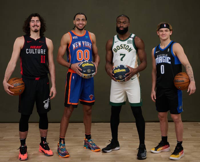 Jamie Jaquez Jr. #11 ; Jacob Toppin #00 ; Jaylen Brown #7 and Mac McClang #0 of the AT&amp;T Dunk Contest participants pose for a photo during State Farm Saturday Night NBA All-Star Weekend