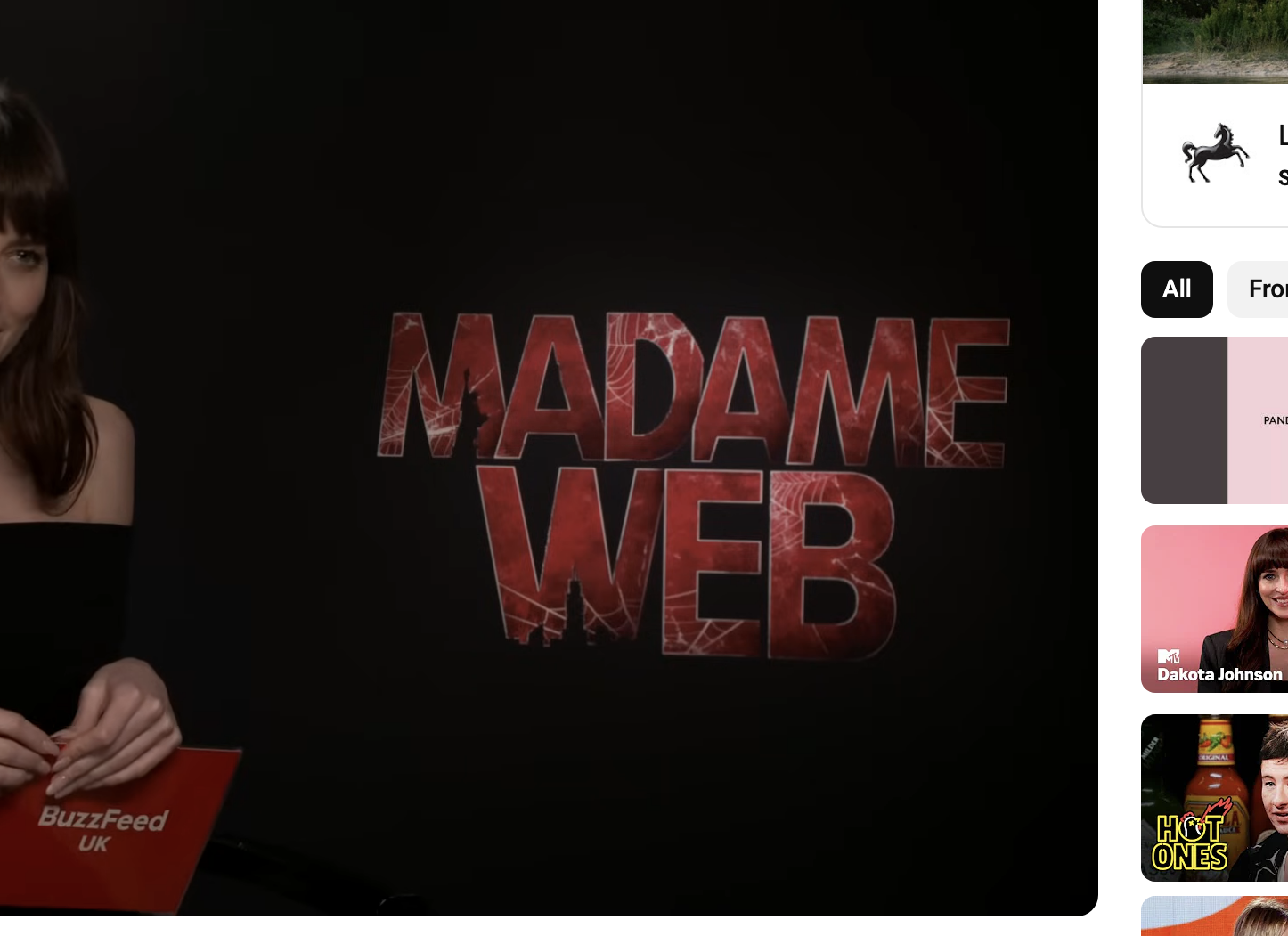 Dakota Johnson holds cards in a &quot;Madame Web&quot; themed BuzzFeed video