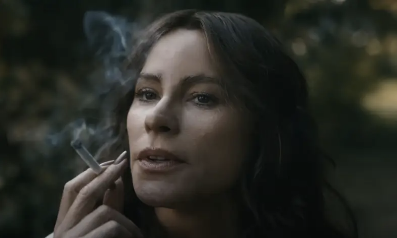 Close-up of Sofía as Griselda smoking a cigarette