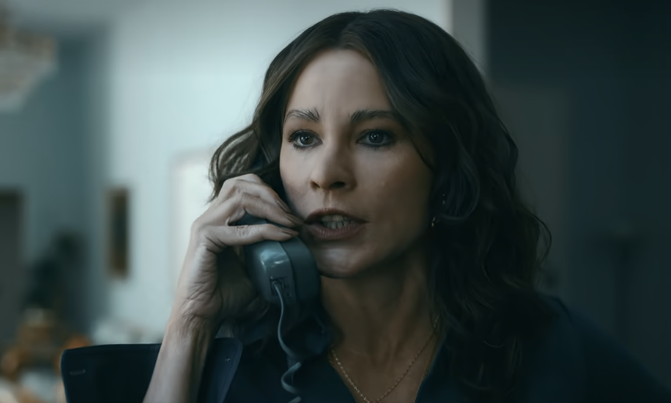 Close-up of Sofía as Griselda on the phone