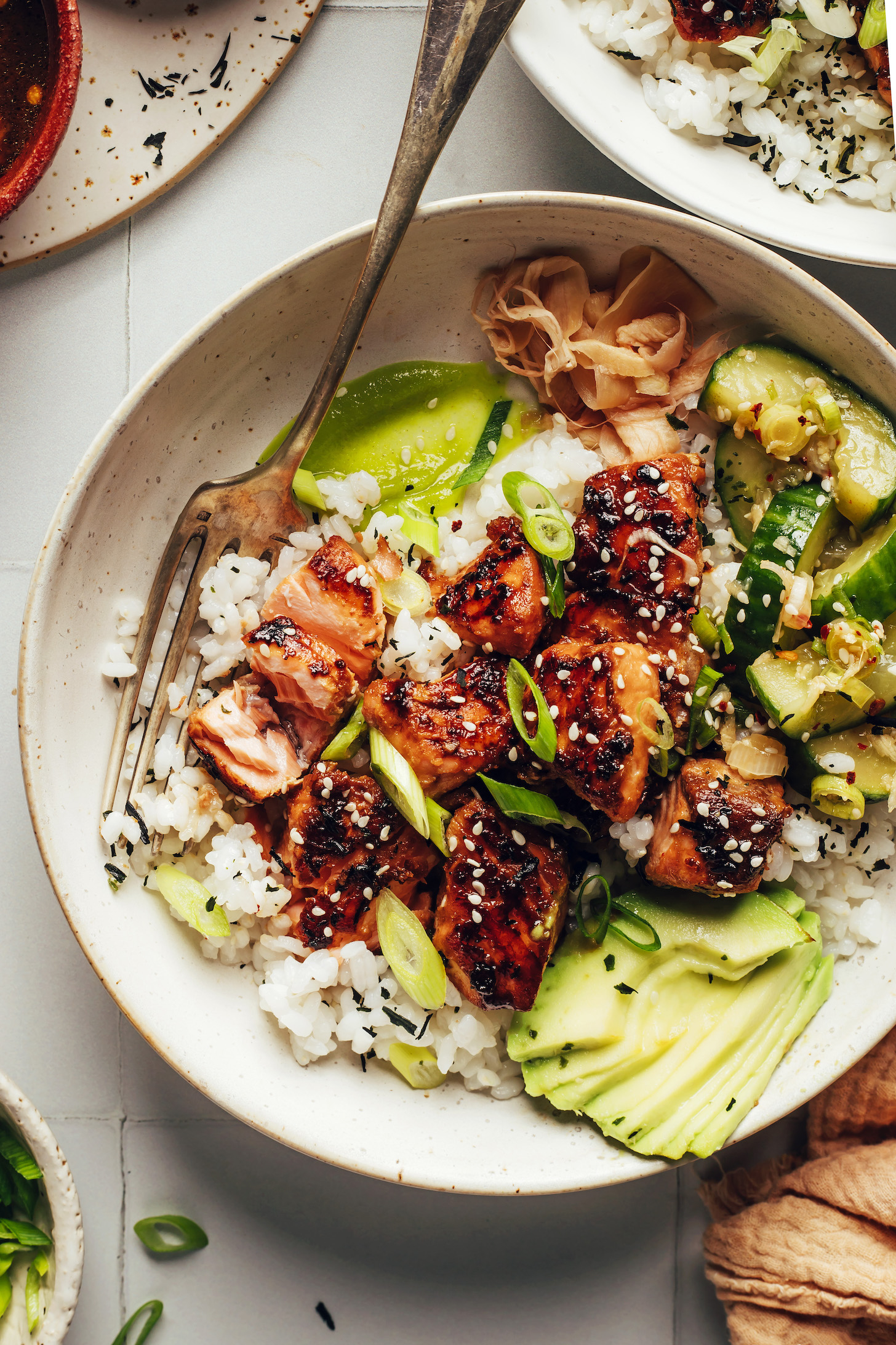Salmon sushi bowl with rice and avocado
