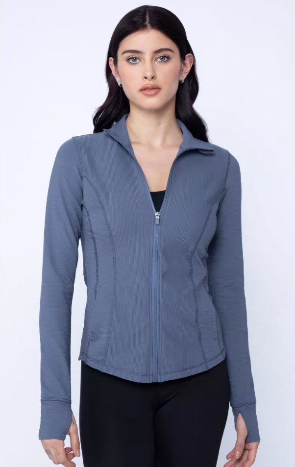 blue zip up jacket on model