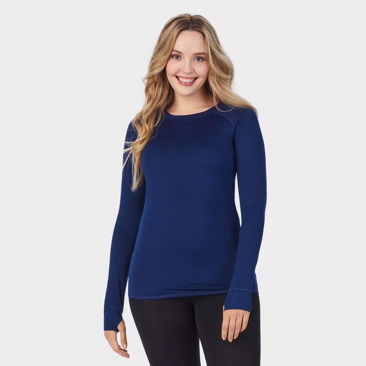 blue long sleeve top with thumbholes on model
