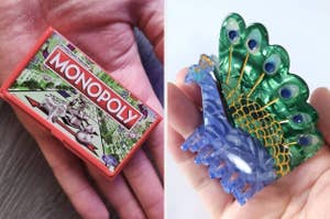 a mini monopoly game in the palm of a hand; a hand holding a peacock-shaped hair claw clip