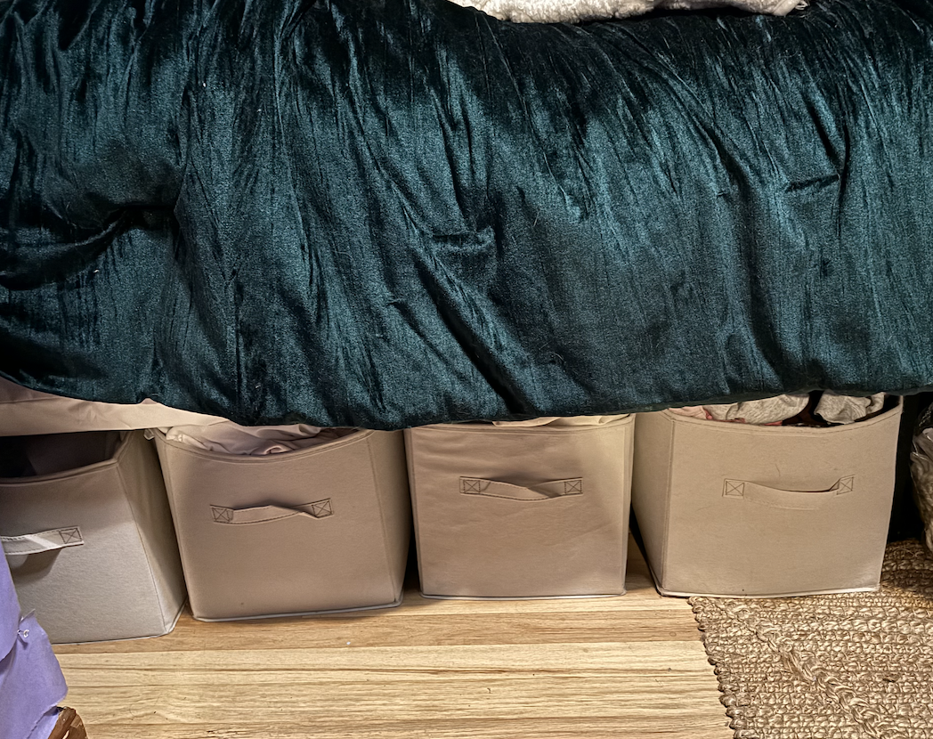 storage bins under a bed