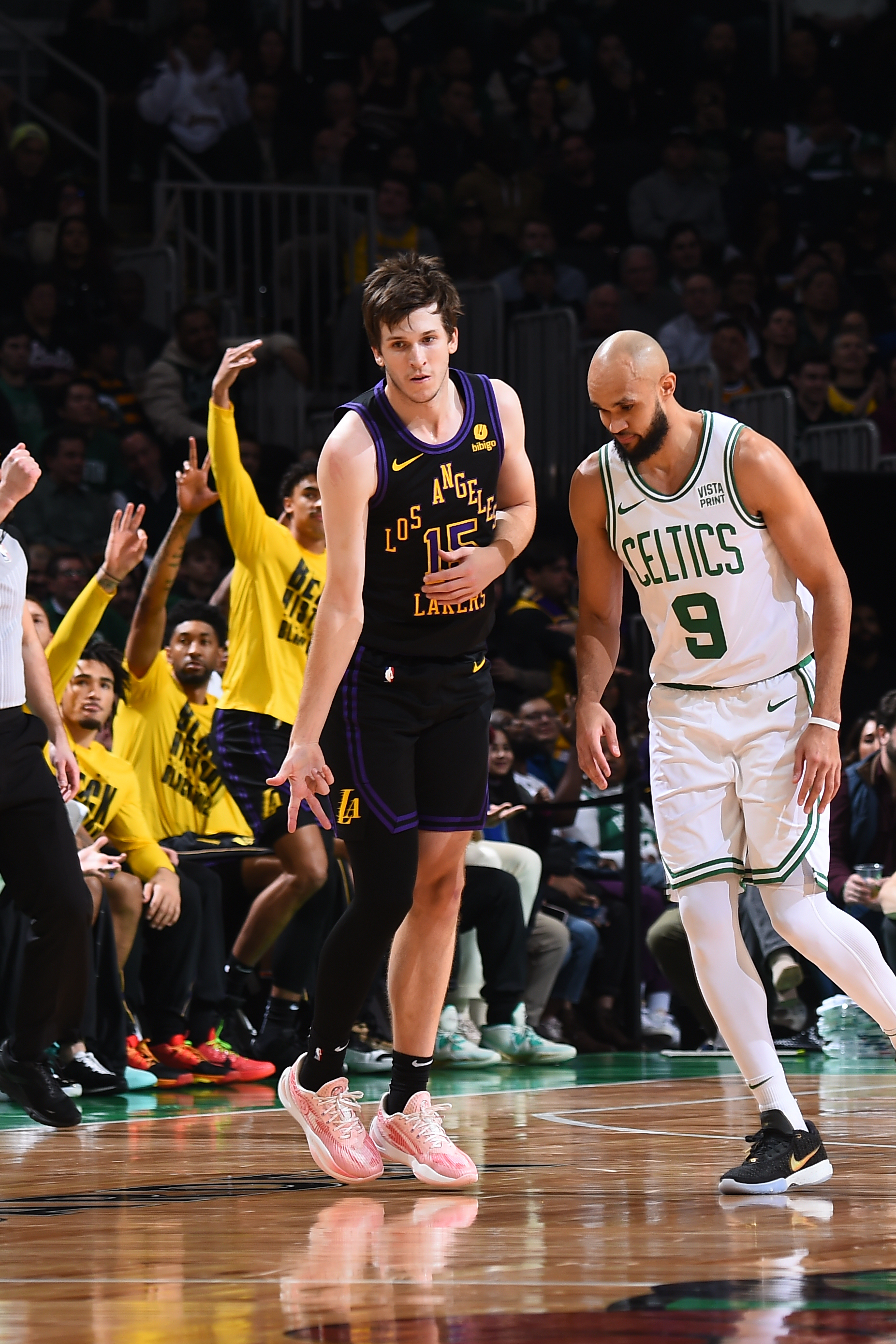 FEBRUARY 1: Austin Reaves #15 of the Los Angeles Lakers celebrates during the game against the Boston Celtics on February 1, 2024 at the TD Garden in Boston, Massachusetts.