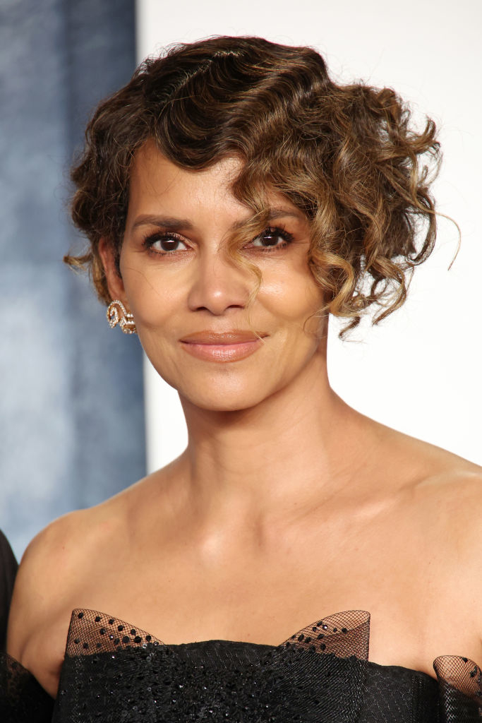 Close-up of Halle at a media event in a strapless outfit