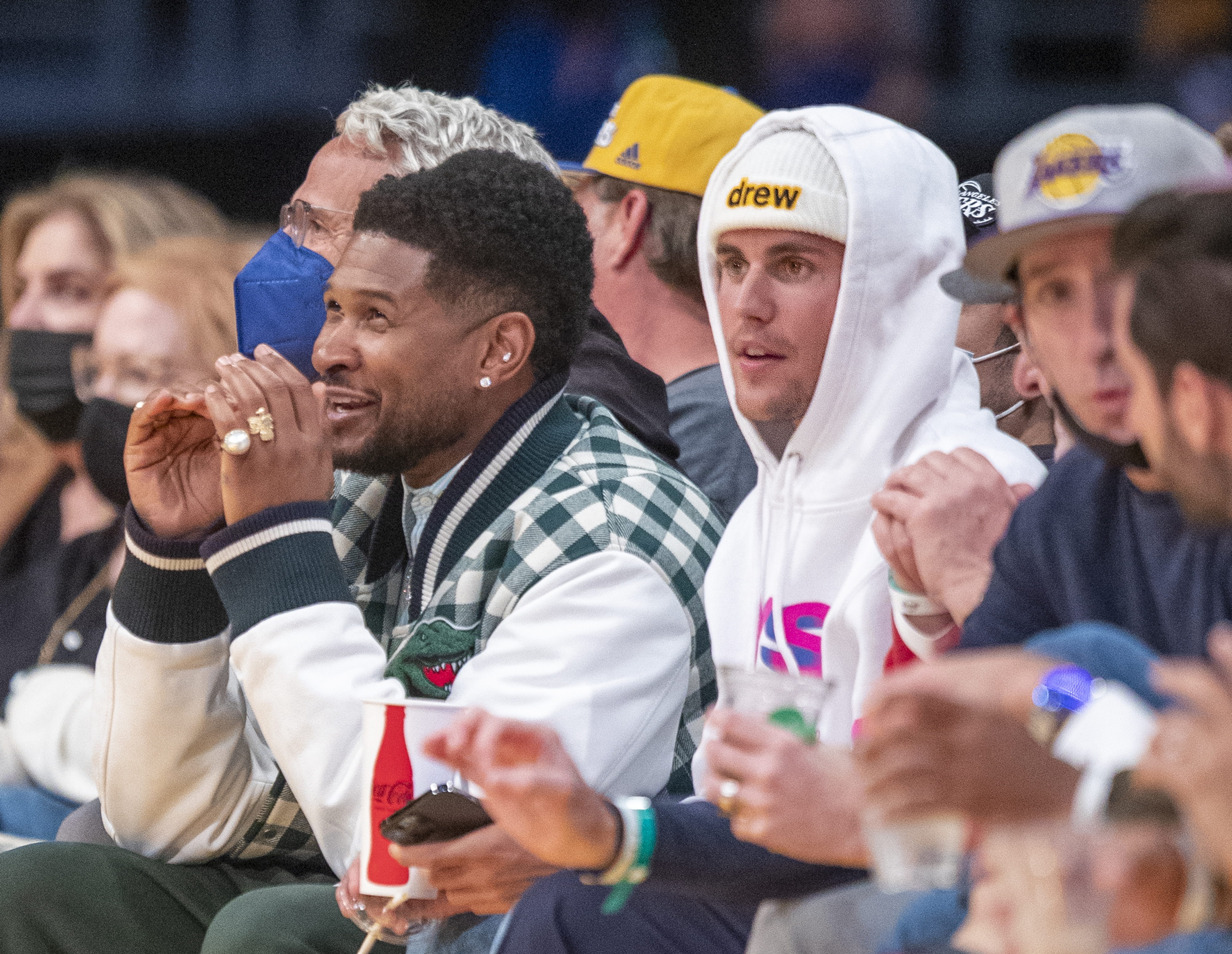 Usher and Justin Bieber at a sporting event