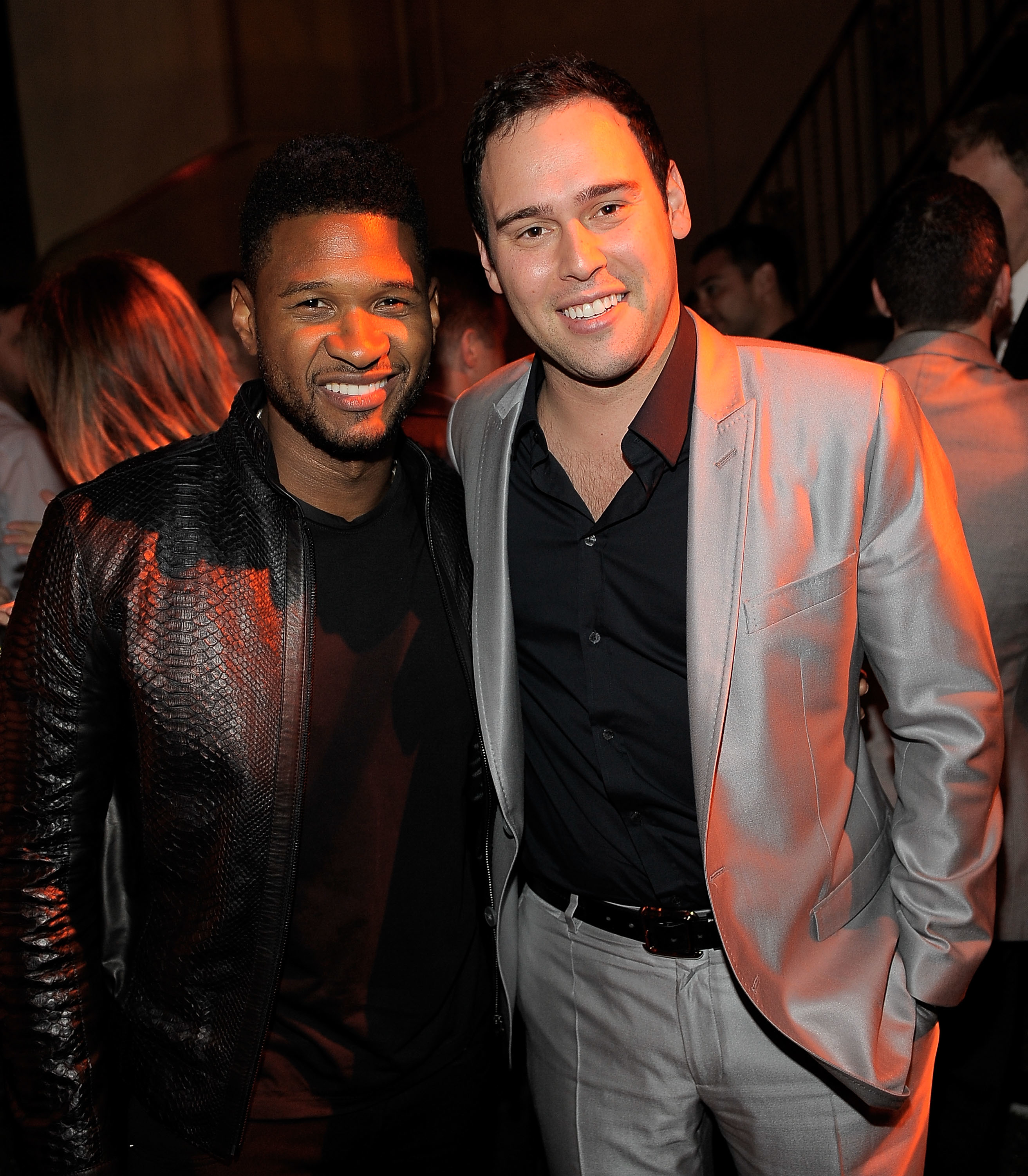 scooter and usher posing together at an event