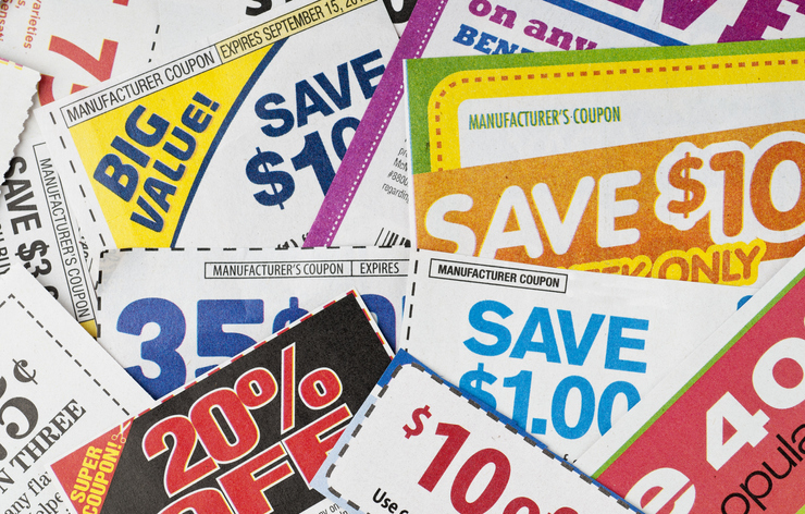Various discount coupons overlapping, offering savings from 35 cents to $10